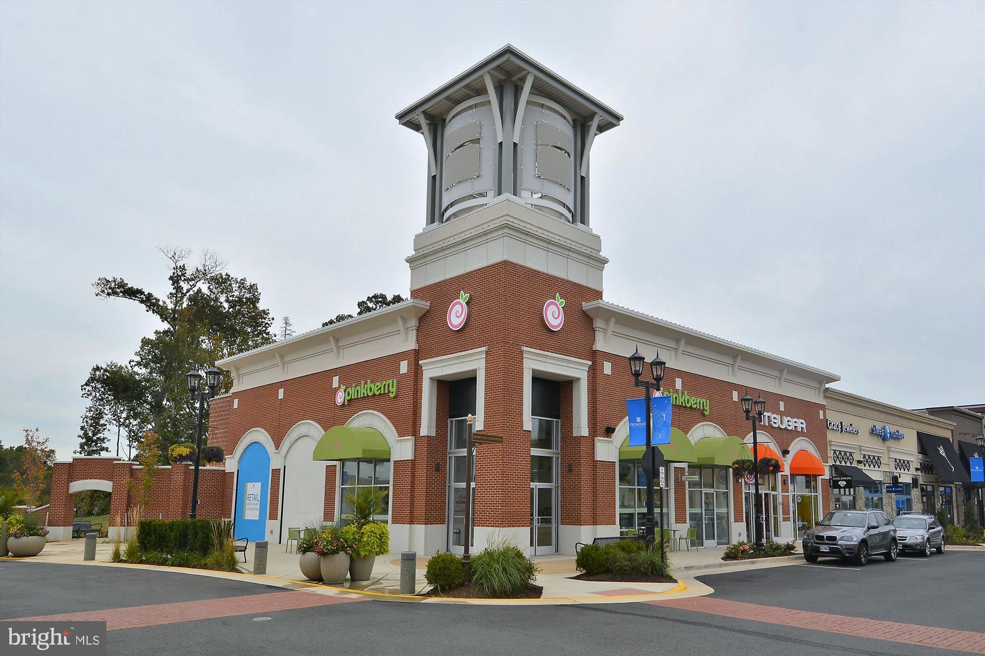 6688 Roderick Loop Gainesville, VA 20155 - Photo 34 of 40 a front view of a building and a street