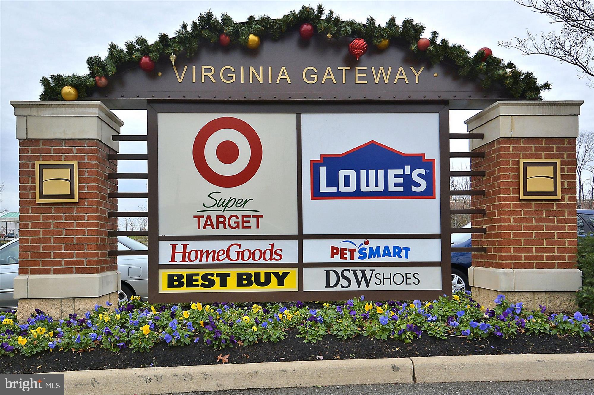 6688 Roderick Loop Gainesville, VA 20155 - Photo 35 of 40 a sign on the street of a building