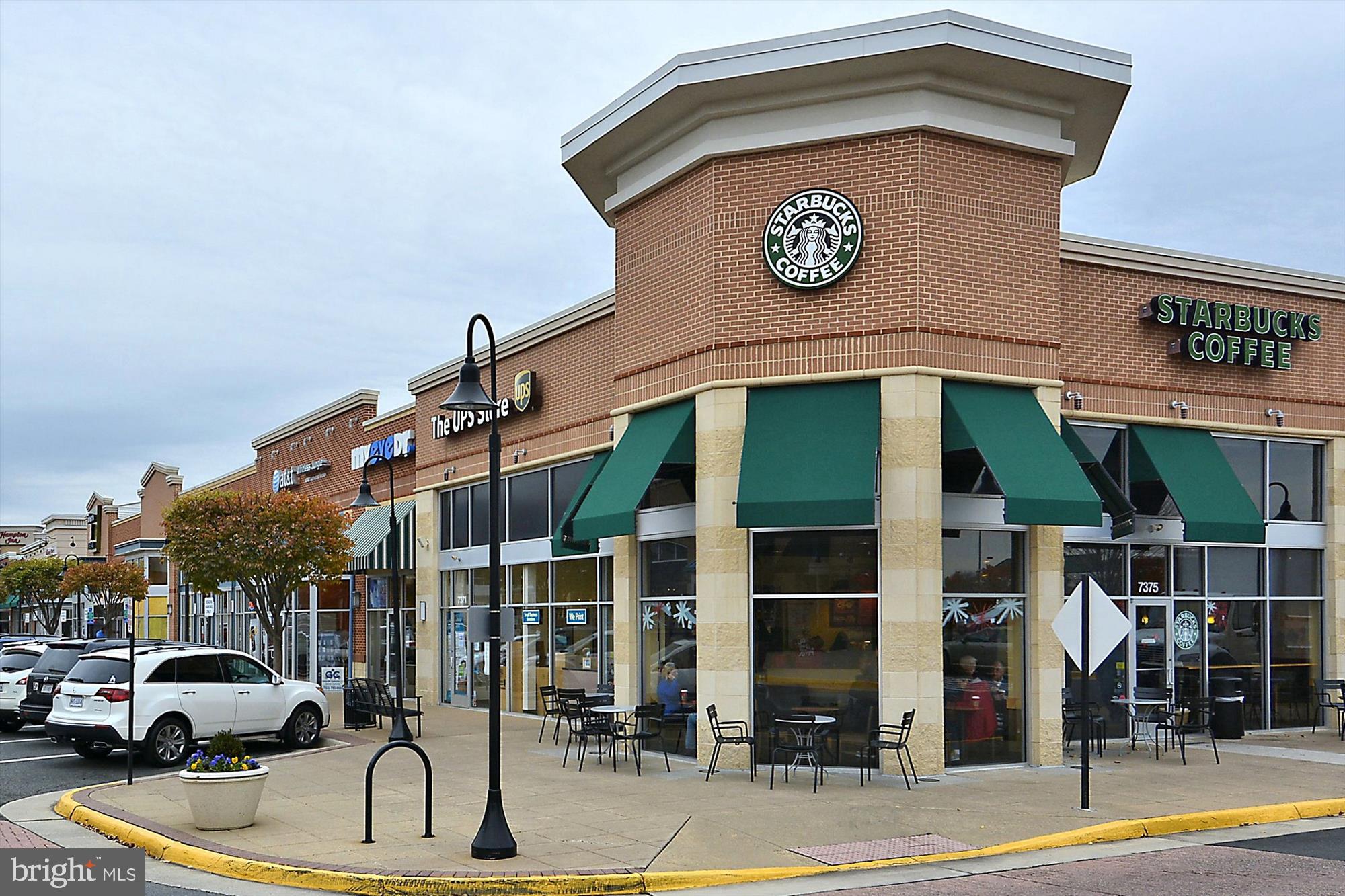6688 Roderick Loop Gainesville, VA 20155 - Photo 38 of 40 a view of a building with car parked