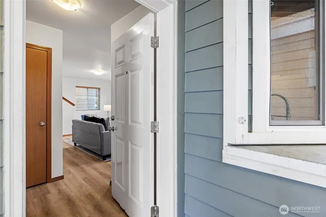 a view of a kitchen from the hallway