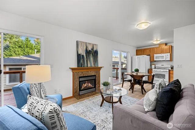 a living room with furniture or couch and a fireplace