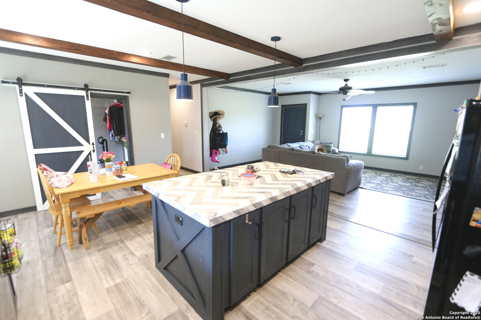 7510 Pittman Road Adkins, TX 78101 - Photo 19 of 42 a view of kitchen island with granite countertop sink