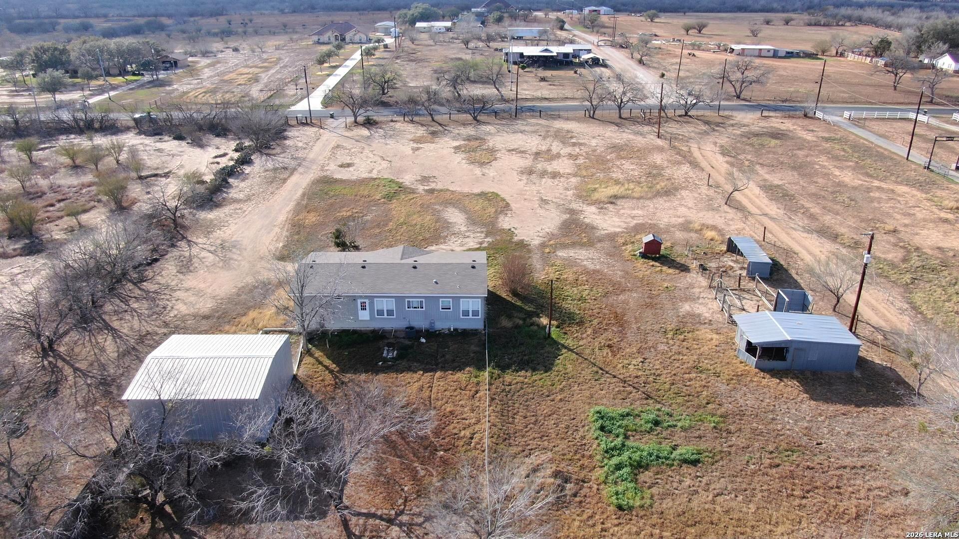 7510 Pittman Road Adkins, TX 78101 - Photo 3 of 42 an aerial view of residential houses with outdoor space