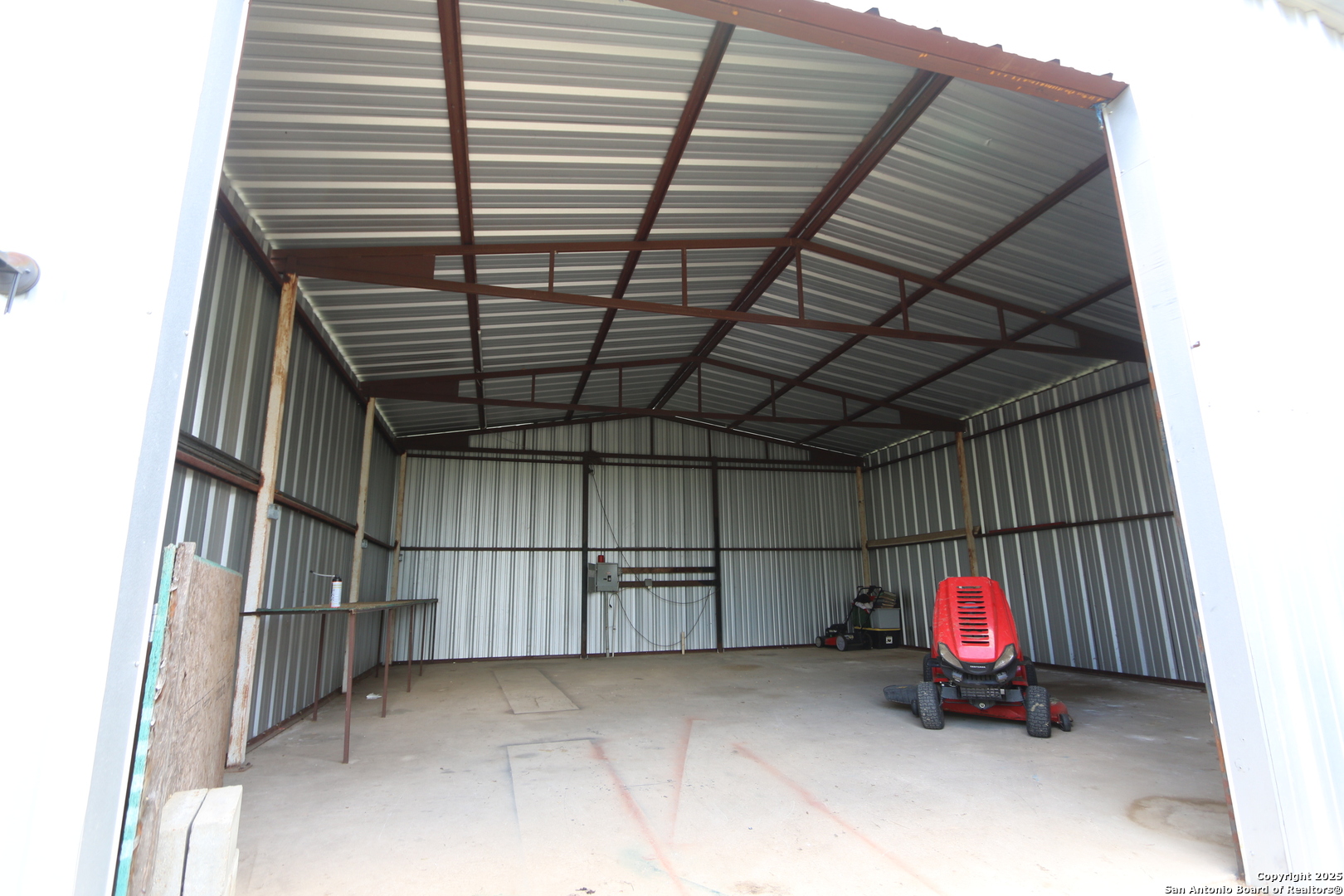 7510 Pittman Road Adkins, TX 78101 - Photo 35 of 42 a view of storage and utility room