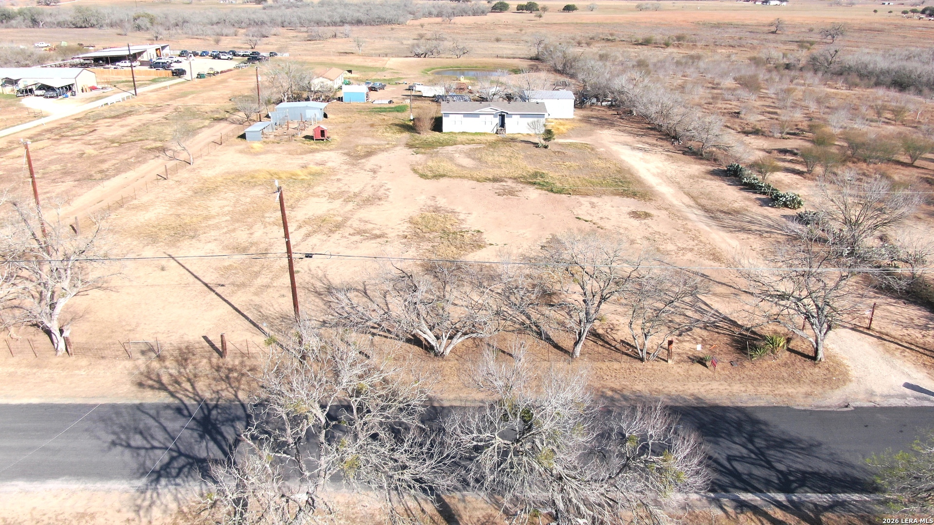 7510 Pittman Road Adkins, TX 78101 - Photo 41 of 42 a view of a yard with snow on the road