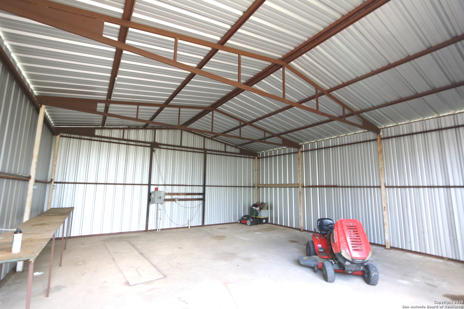 7510 Pittman Road Adkins, TX 78101 - Photo 7 of 42 a view of storage and utility room