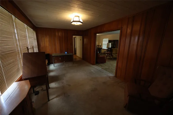 a kitchen with a refrigerator a stove a sink a washer and dryer