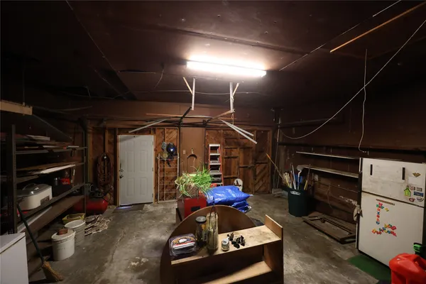 a bathroom with a sink a mirror and a shower