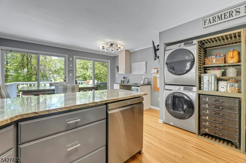 100 Easedale Road, Unit 100 Wayne, NJ 07470 - Photo 16 of 43 a view of a kitchen with washer and dryer