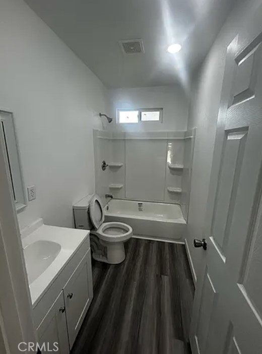 648 East Cerritos Street, Unit 2 Rialto, CA 92376 - Photo 3 of 6 a bathroom with a sink a toilet and shower