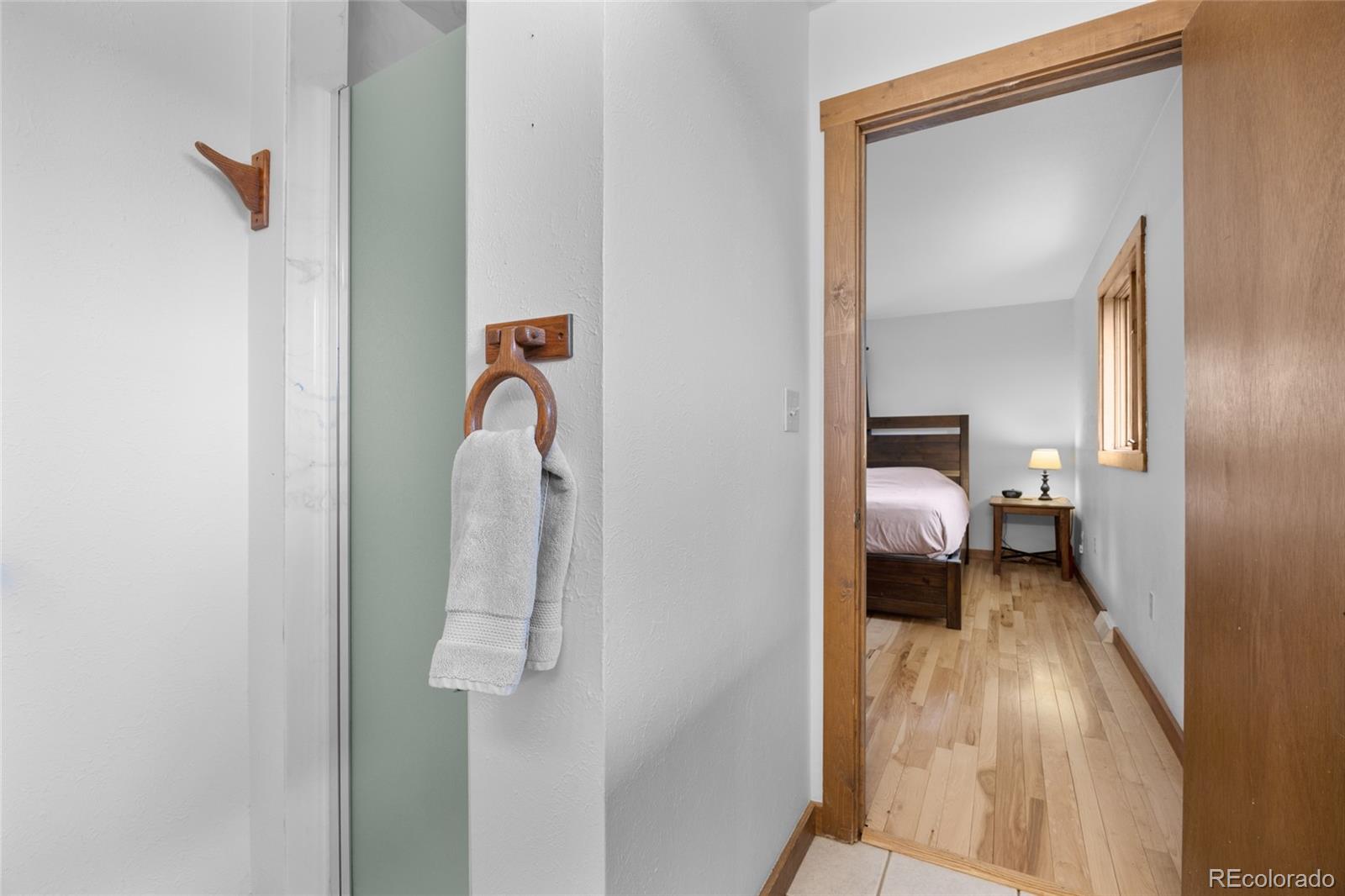730 Clear Creek Road Evergreen, CO 80439 - Photo 23 of 44 a close view of a bathroom sink and a mirror