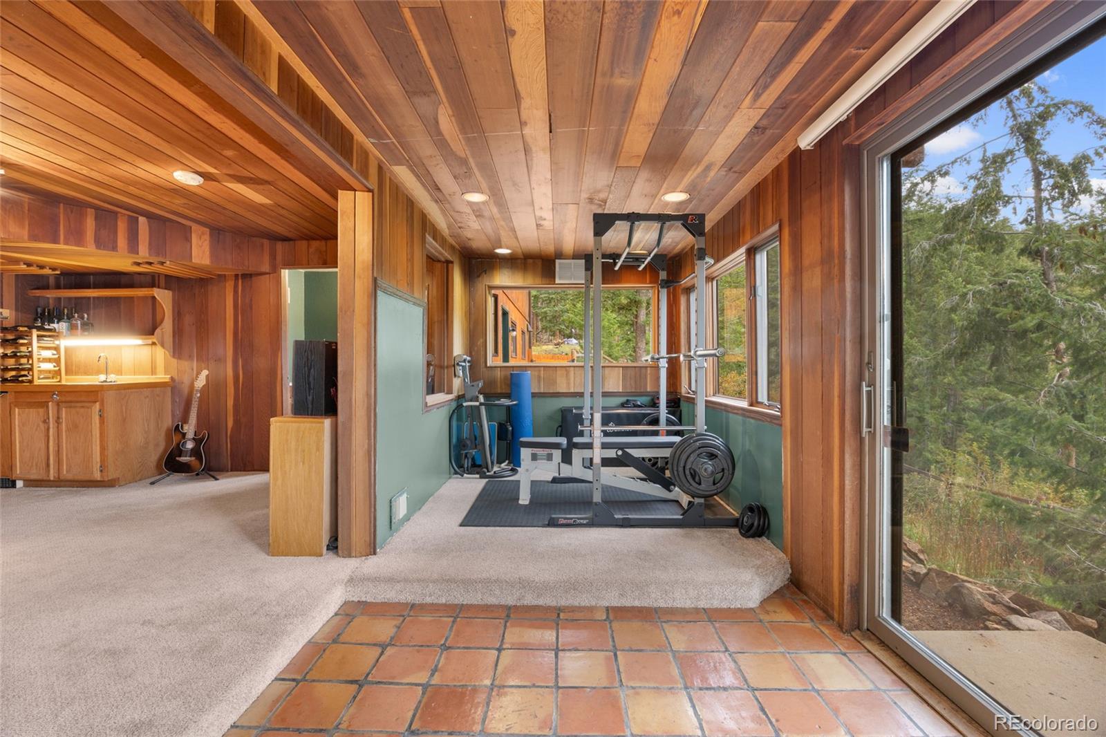 730 Clear Creek Road Evergreen, CO 80439 - Photo 34 of 44 a very nice looking room with a large window