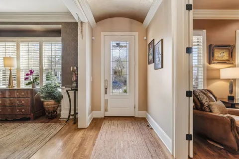 a view of a livingroom with furniture and windows