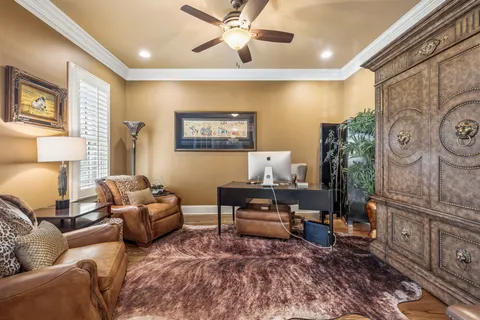 a living room with furniture and a rug