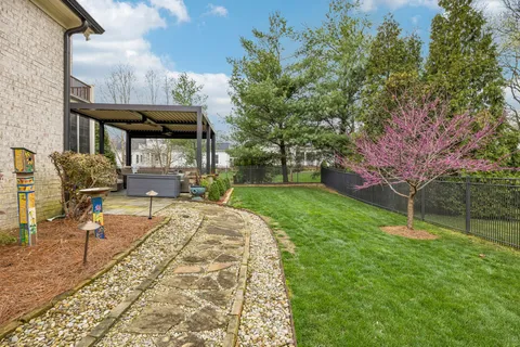 a house with garden in front of it
