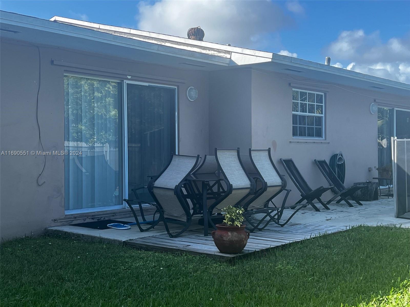 16331 Southwest 104th Avenue Miami, FL 33157 - Photo 22 of 23 a view of outdoor space yard and patio