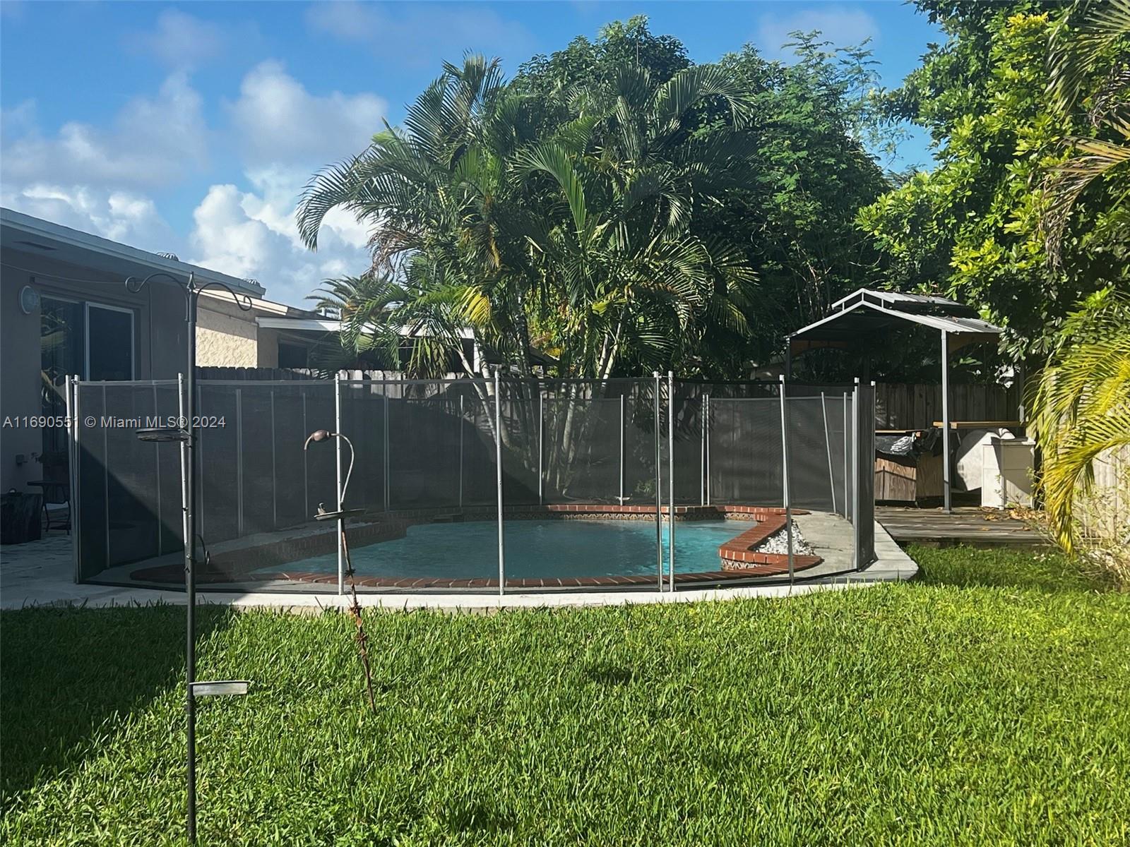 16331 Southwest 104th Avenue Miami, FL 33157 - Photo 23 of 23 a view of a garden