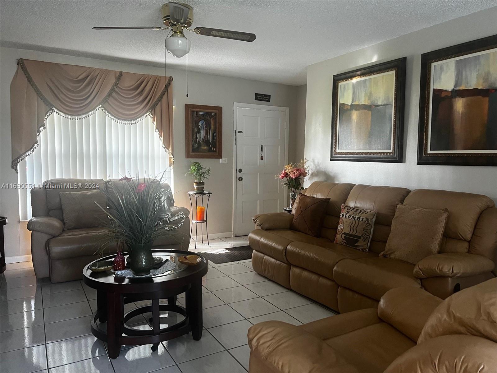 16331 Southwest 104th Avenue Miami, FL 33157 - Photo 5 of 23 a living room with furniture and a window