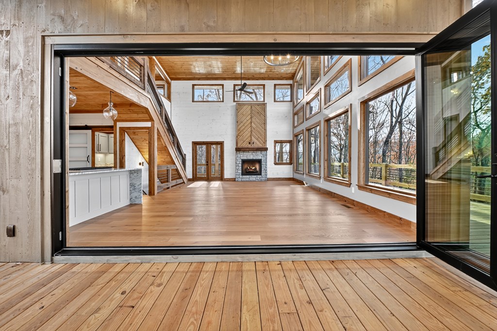 22 Mountain Trace Cherry Log, GA 30522 - Photo 11 of 49 wooden floor in an empty room with a window