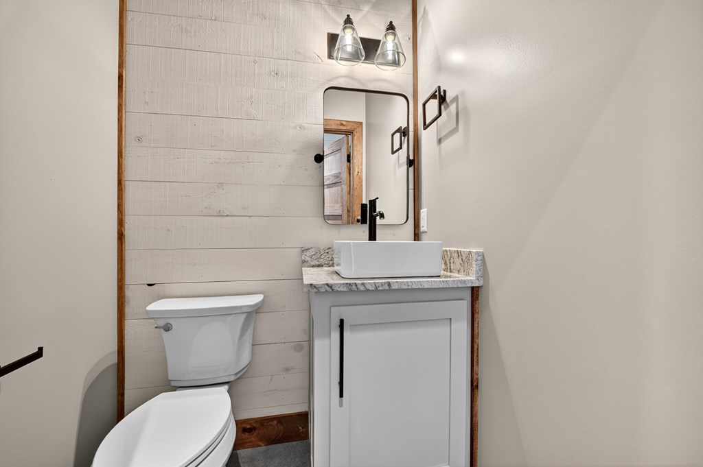 22 Mountain Trace Cherry Log, GA 30522 - Photo 18 of 49 a bathroom with a toilet a sink and mirror