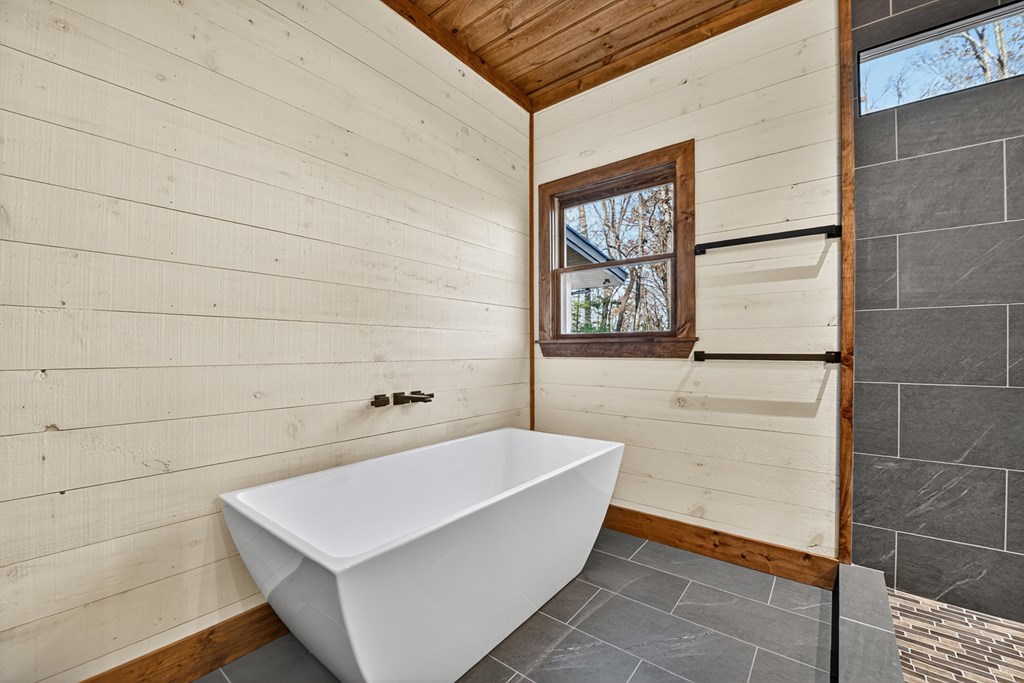 22 Mountain Trace Cherry Log, GA 30522 - Photo 24 of 49 a bathroom with a bathtub and shower