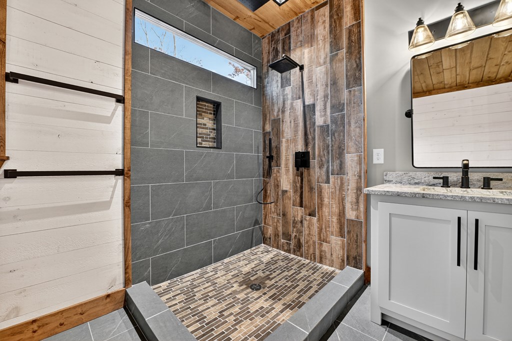 22 Mountain Trace Cherry Log, GA 30522 - Photo 25 of 49 a bathroom with a sink and a mirror
