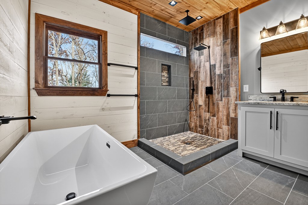 22 Mountain Trace Cherry Log, GA 30522 - Photo 26 of 49 a bathroom with a sink and a mirror