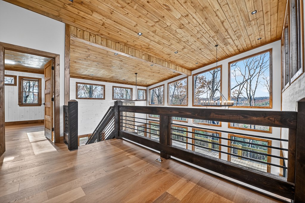 22 Mountain Trace Cherry Log, GA 30522 - Photo 28 of 49 a view of a porch with wooden floor and furniture