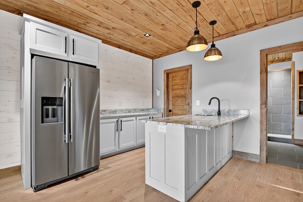 22 Mountain Trace Cherry Log, GA 30522 - Photo 38 of 49 a kitchen with stainless steel appliances granite countertop a refrigerator a sink and dishwasher