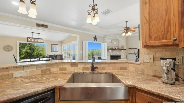 a kitchen with a sink and a window