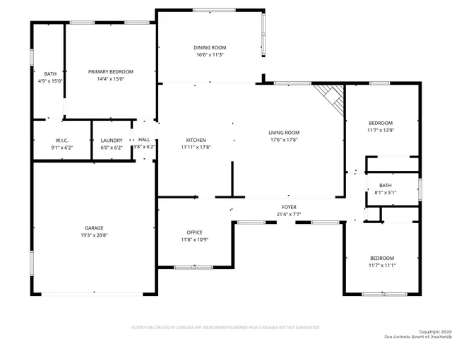 a picture of a wall with a white building and a painting of the