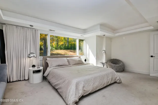 a bathroom with a tub and a shower