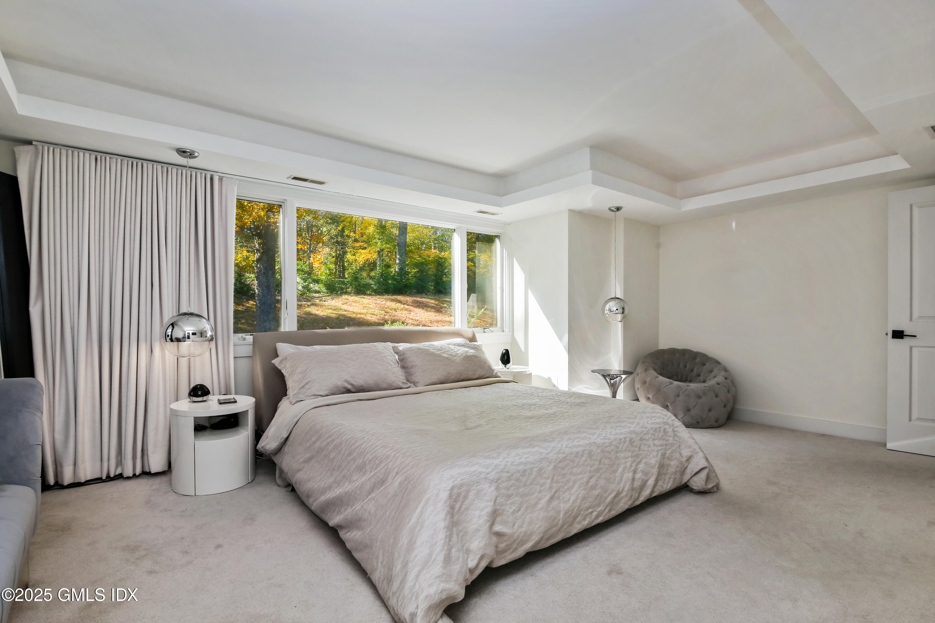 210 Red Fox Road Stamford, CT 06903 - Photo 13 of 25 a bedroom with a bed and window