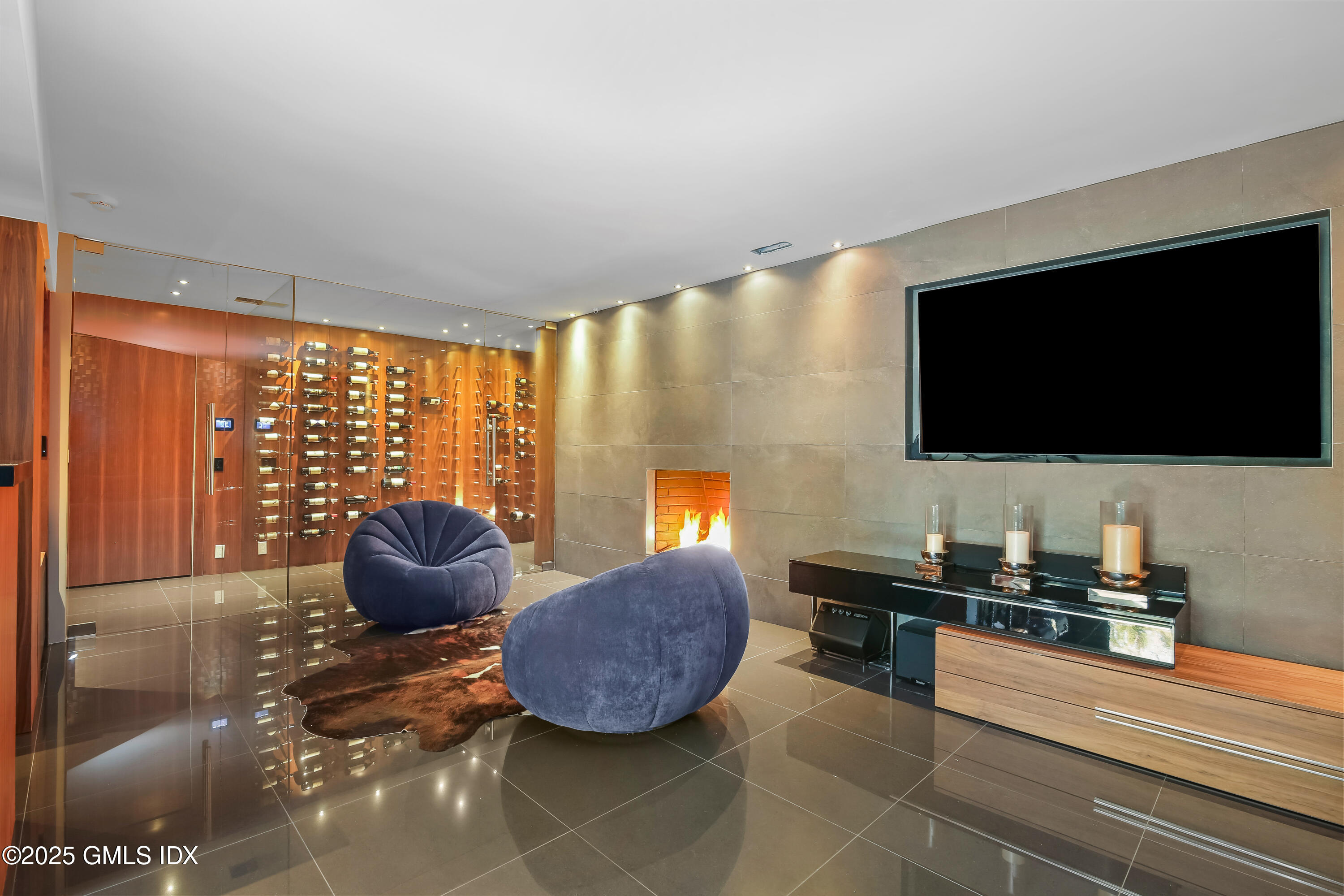 210 Red Fox Road Stamford, CT 06903 - Photo 19 of 25 a living room with furniture and a flat screen tv