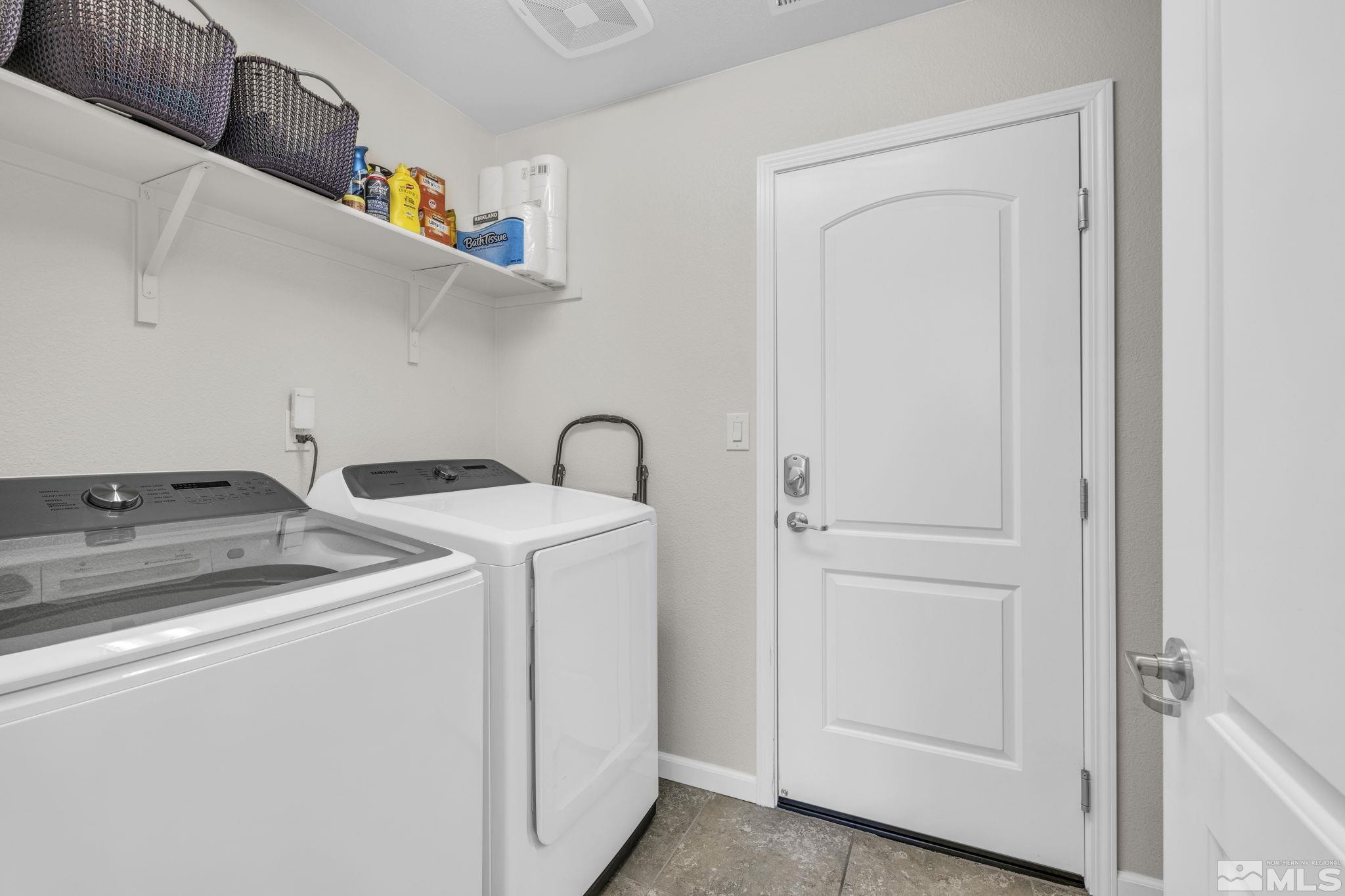 2215 Symphony Way Reno, NV 89521 - Photo 22 of 39 a utility room with dryer and washer