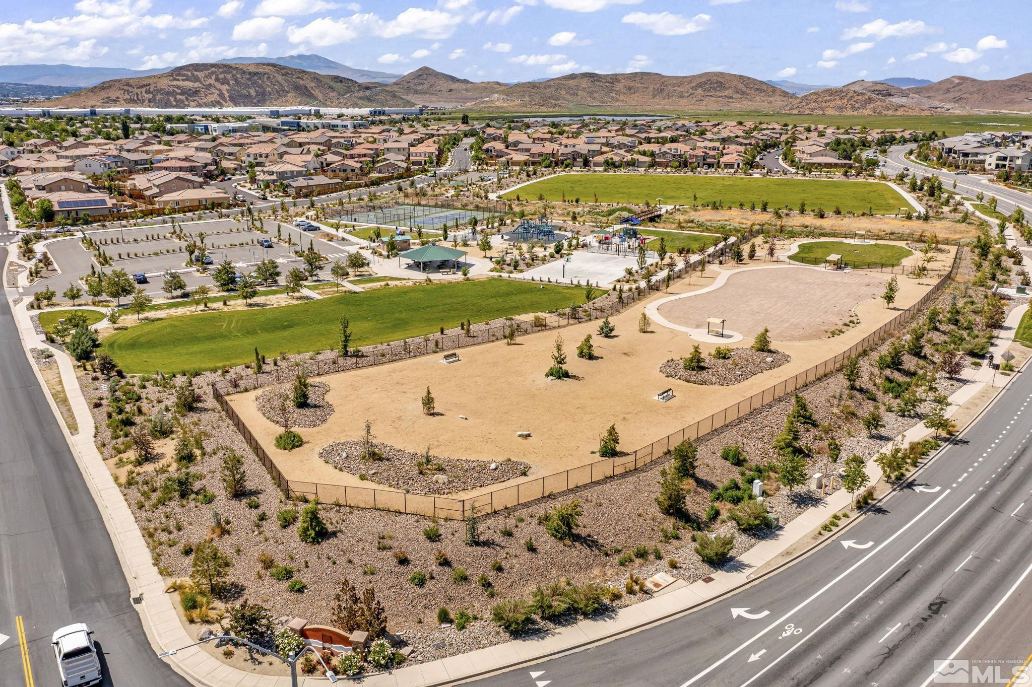 2215 Symphony Way Reno, NV 89521 - Photo 27 of 39 a view of a swimming pool with a lake