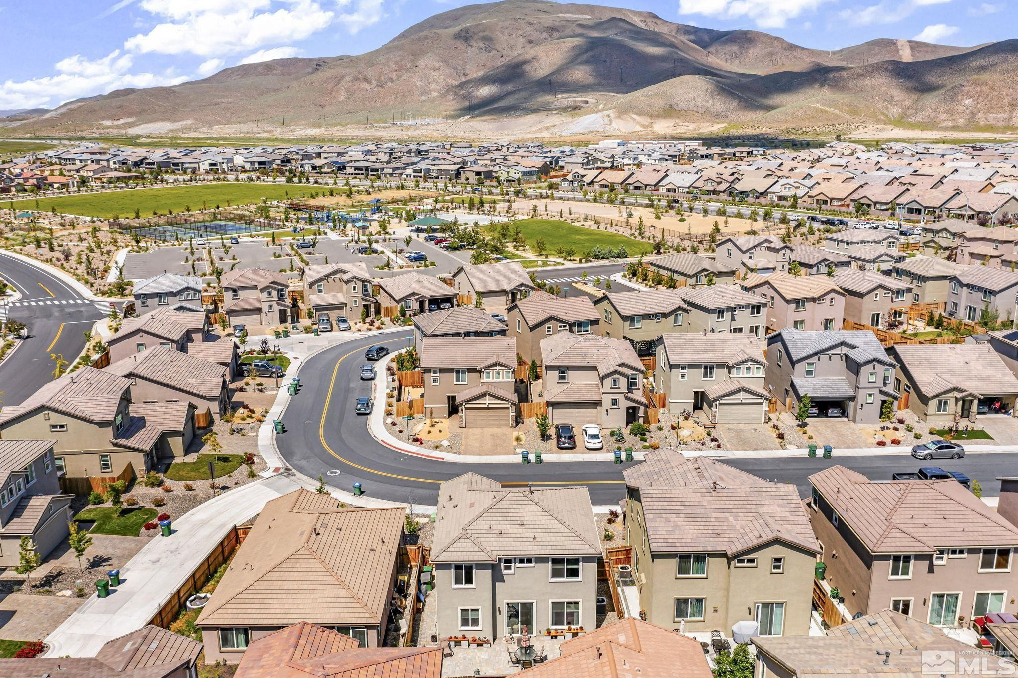 2215 Symphony Way Reno, NV 89521 - Photo 28 of 39 an aerial view of residential houses with outdoor space