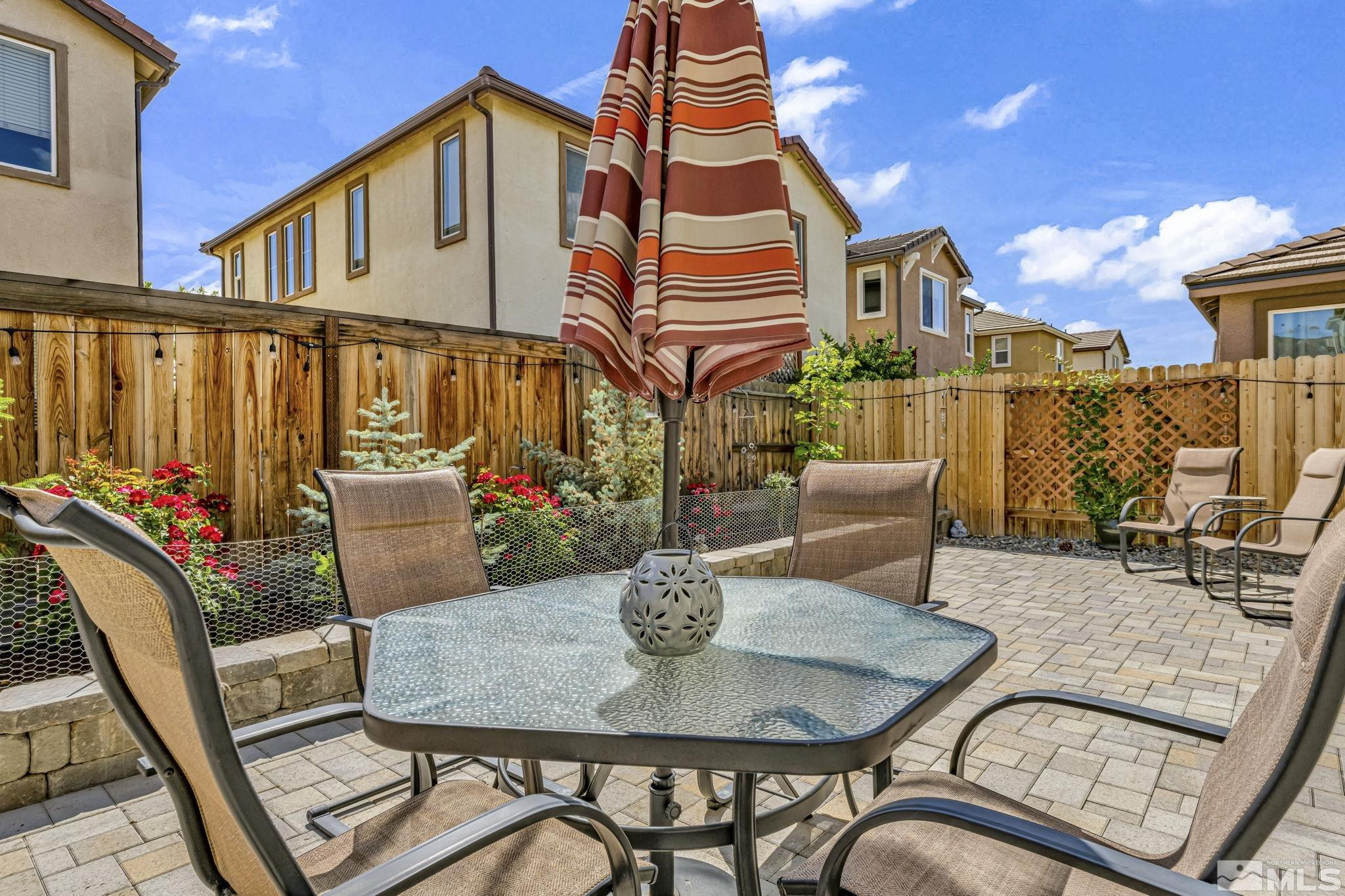 2215 Symphony Way Reno, NV 89521 - Photo 33 of 39 a view of a patio with couches table and chairs