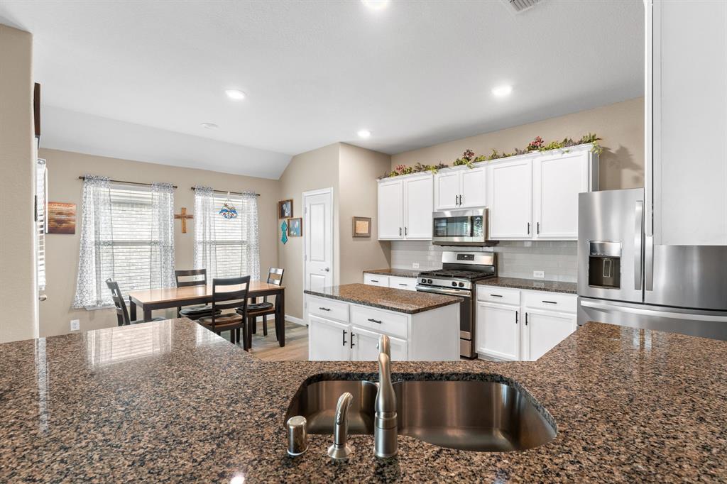 300 Copper Switch Drive Anna, TX 75409 - Photo 8 of 26 kitchen view from Living Room