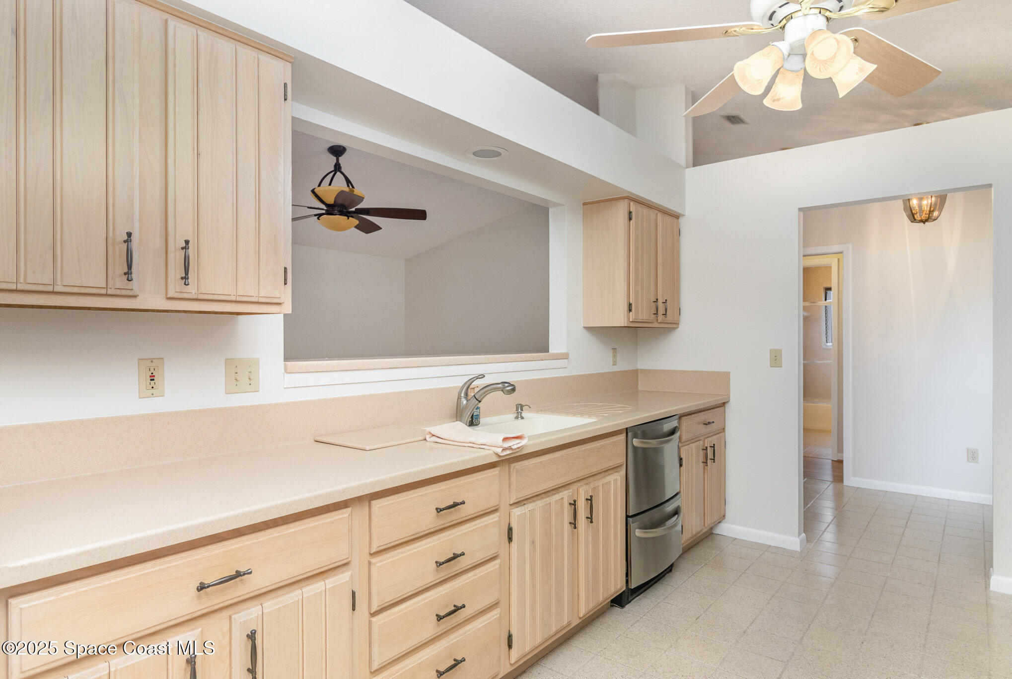 1570 Frontier Drive Melbourne, FL 32940 - Photo 11 of 43 a spacious bathroom with a double vanity sink a mirror and a shower