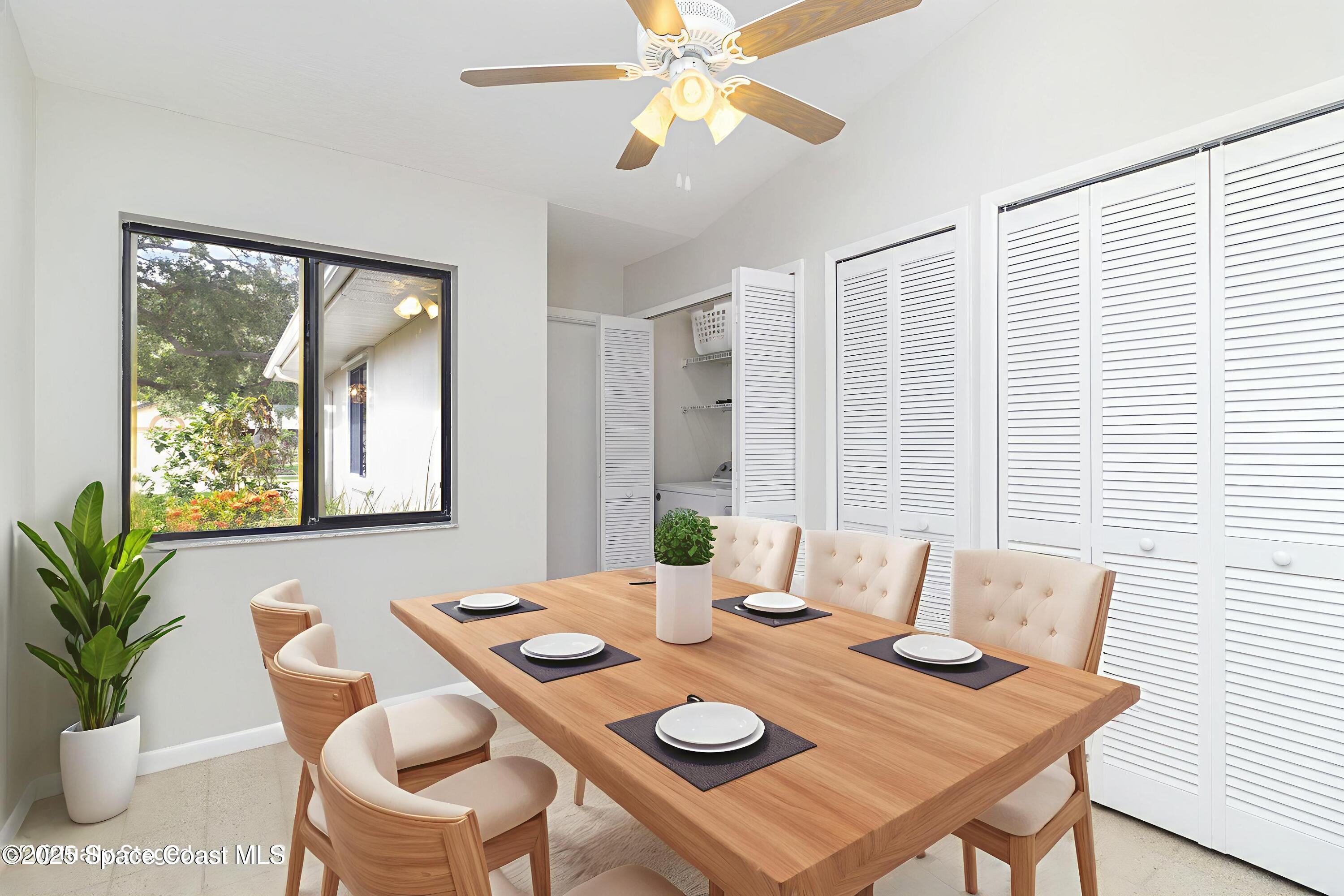 1570 Frontier Drive Melbourne, FL 32940 - Photo 8 of 43 a view of a dining room with furniture and window