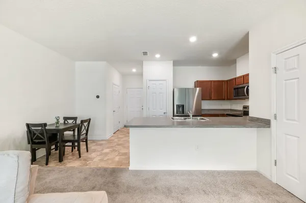 a living room with furniture and a table