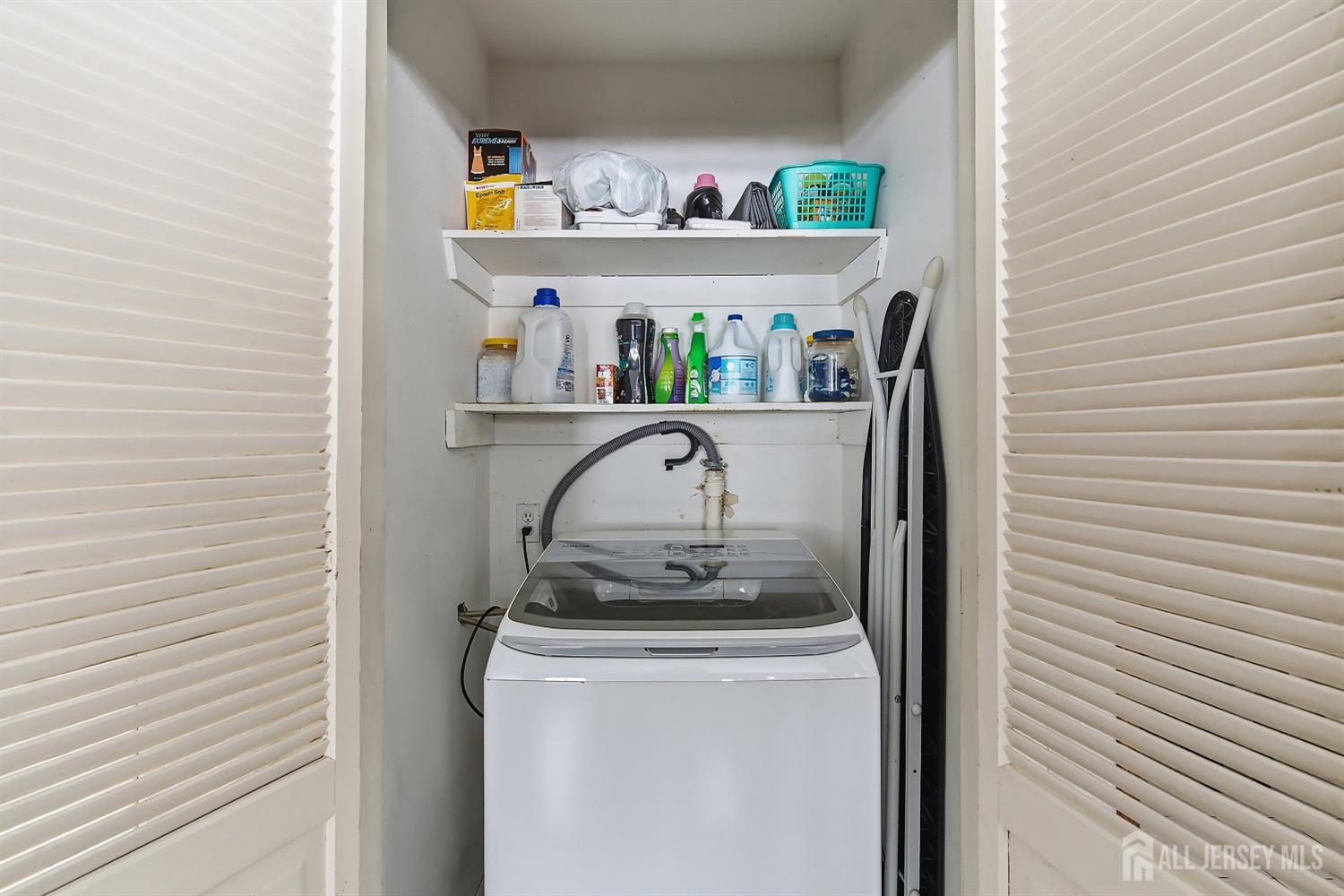 10 Cranston Road Kendall Park, NJ 08824 - Photo 20 of 27 a utility room with dryer and washer
