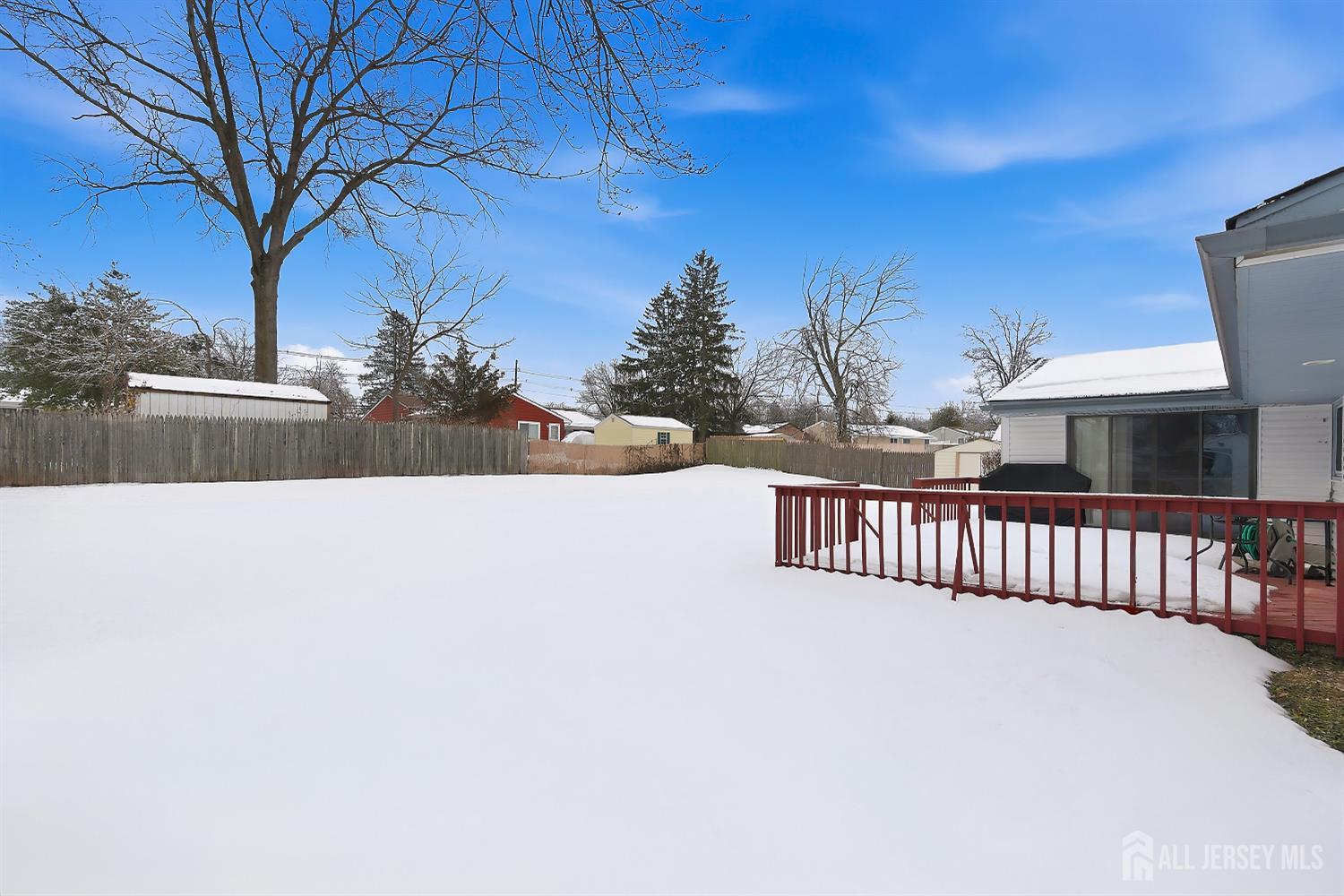 10 Cranston Road Kendall Park, NJ 08824 - Photo 25 of 27 a view of swimming pool and deck in the backyard