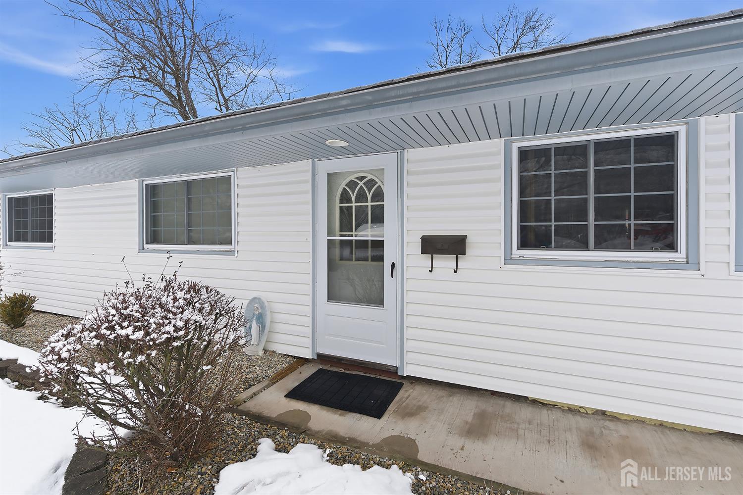 10 Cranston Road Kendall Park, NJ 08824 - Photo 3 of 27 a view of a house with a yard
