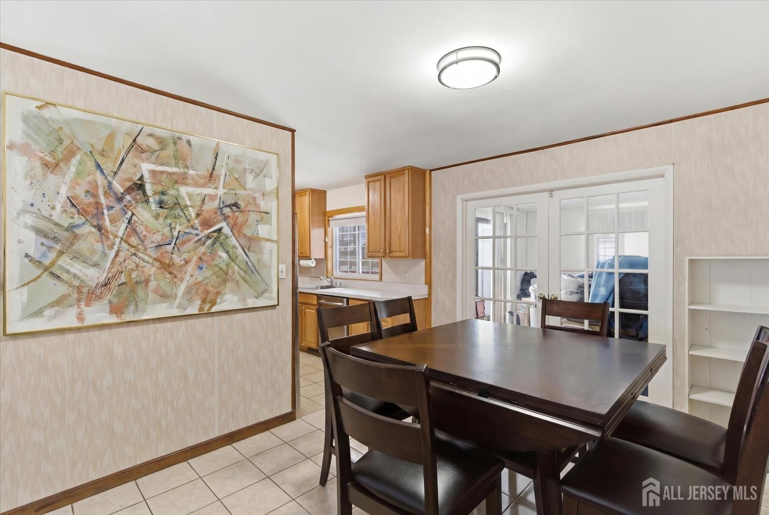 10 Cranston Road Kendall Park, NJ 08824 - Photo 9 of 27 a view of a dining room with furniture