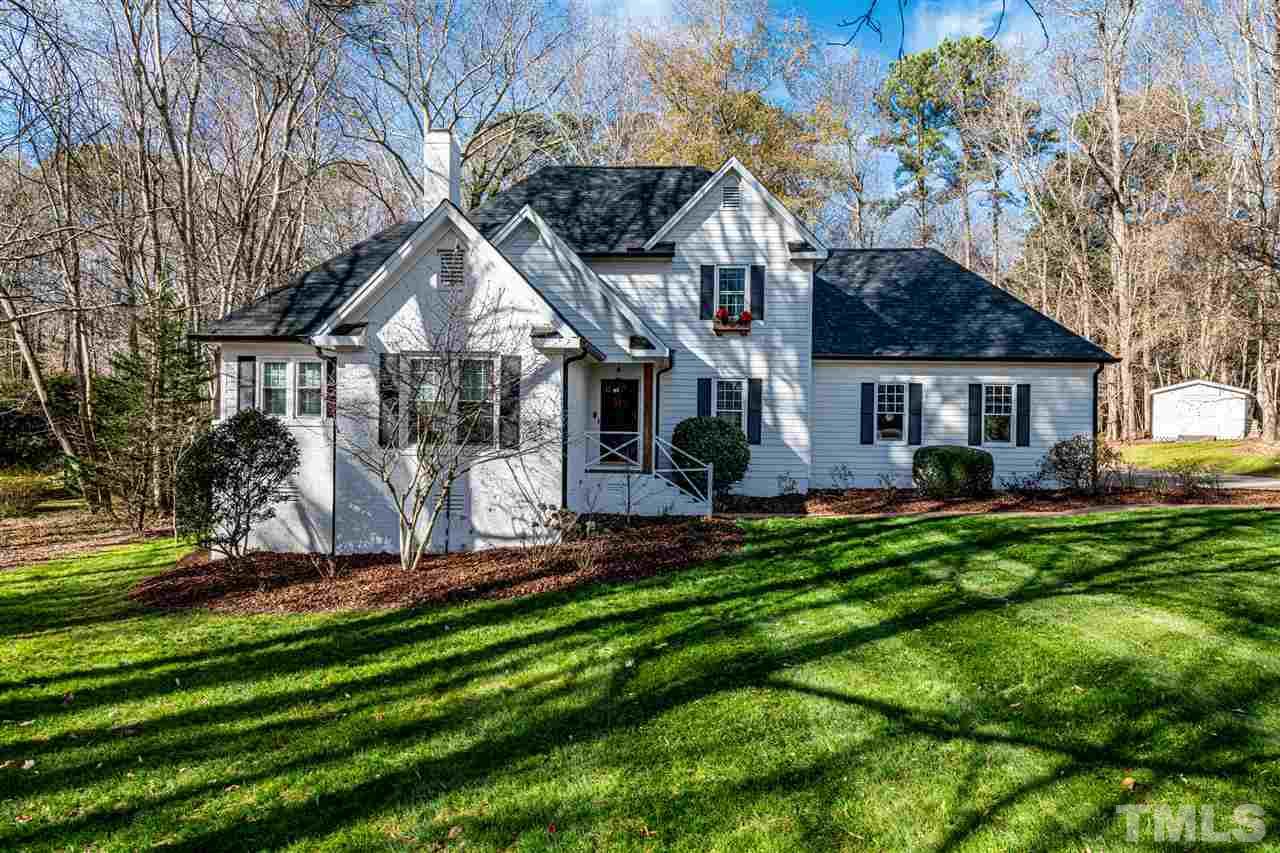 8105 Iron Bark Court Raleigh, NC 27606 - Photo 1 of 30 a front view of a house with a yard