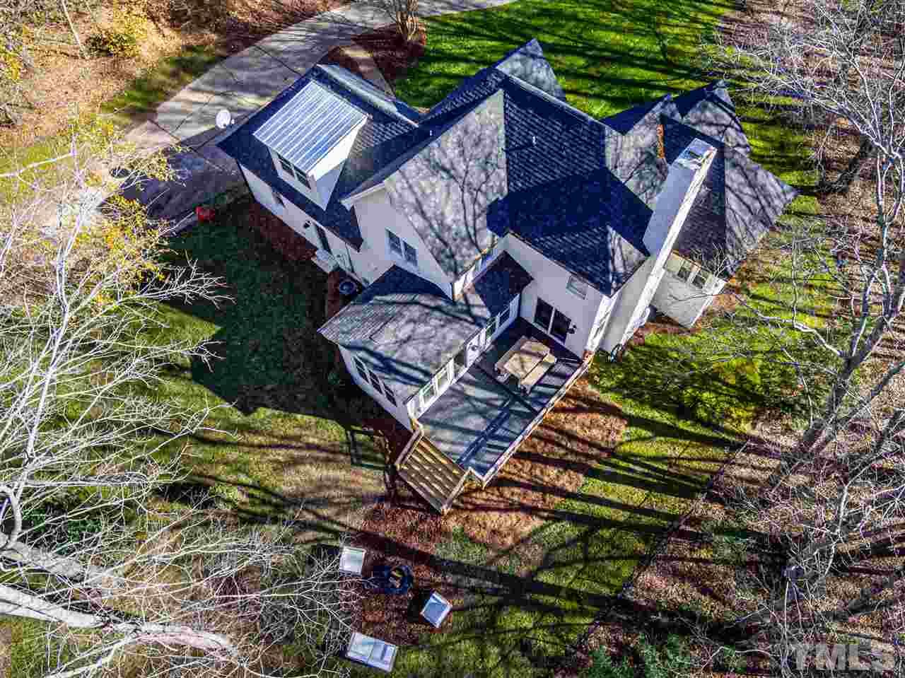 8105 Iron Bark Court Raleigh, NC 27606 - Photo 28 of 30 a aerial view of a house with a big yard and potted plants