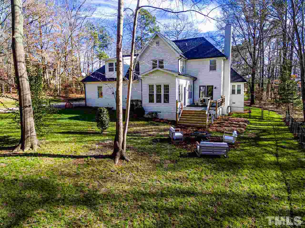 8105 Iron Bark Court Raleigh, NC 27606 - Photo 29 of 30 a front view of a house with garden