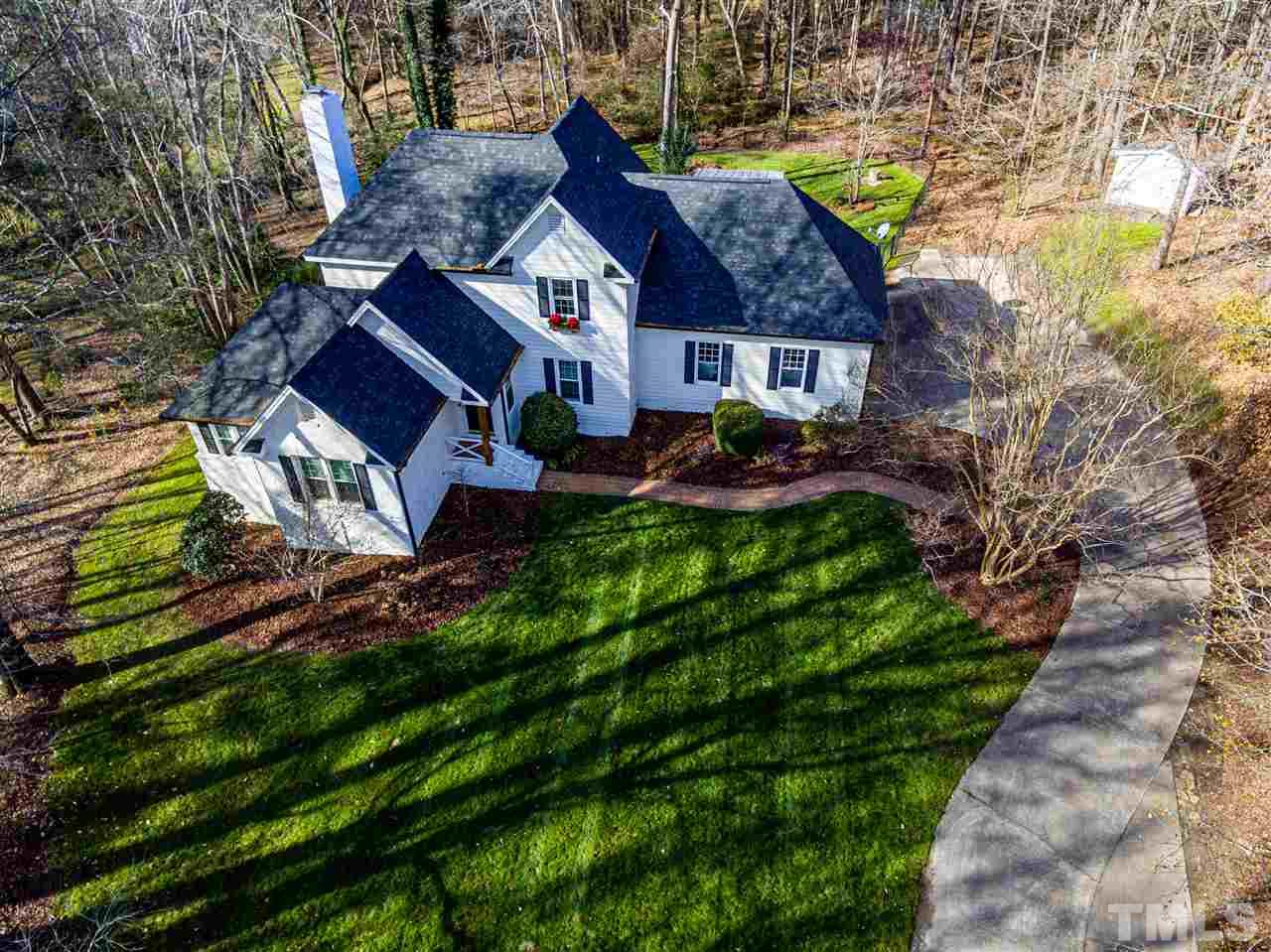 8105 Iron Bark Court Raleigh, NC 27606 - Photo 5 of 30 a front view of house with yard and green space